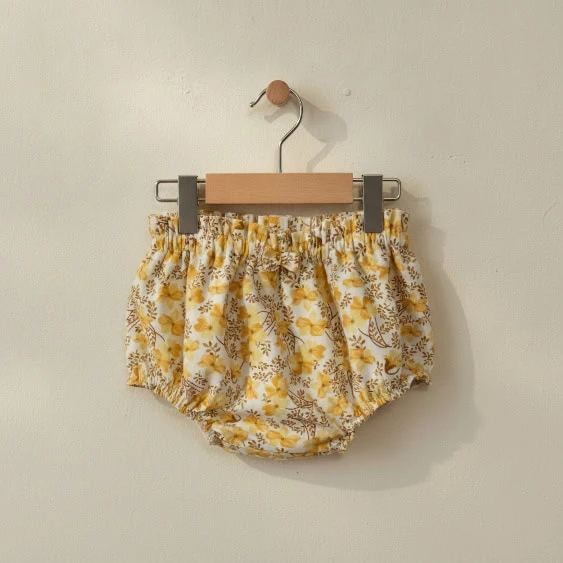 braga bebe cubrepañal verano flores